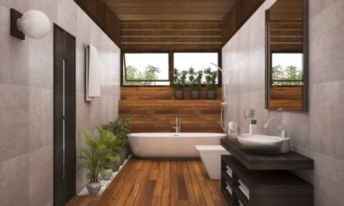 Du kan bruge grønne planter, sten og træ til at skabe et naturligt look på dit badeværelse