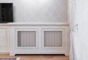 Denne type radiatorskjuler giver dig en ekstra hylde i dit hjem, til opbevaring af ting eller dekorationer