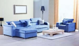 blåt sofaparti i en stue