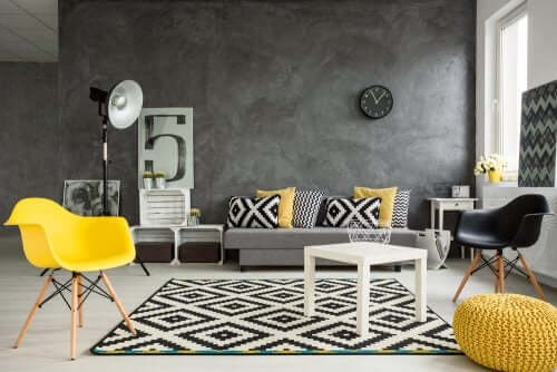 graue Wohnzimmer - grau, schwarz, gelb