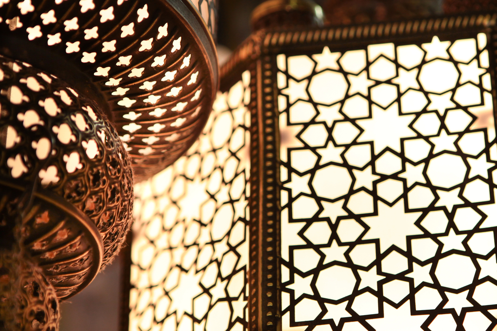 Typical Moroccan lanterns forming mosaics with their holes.