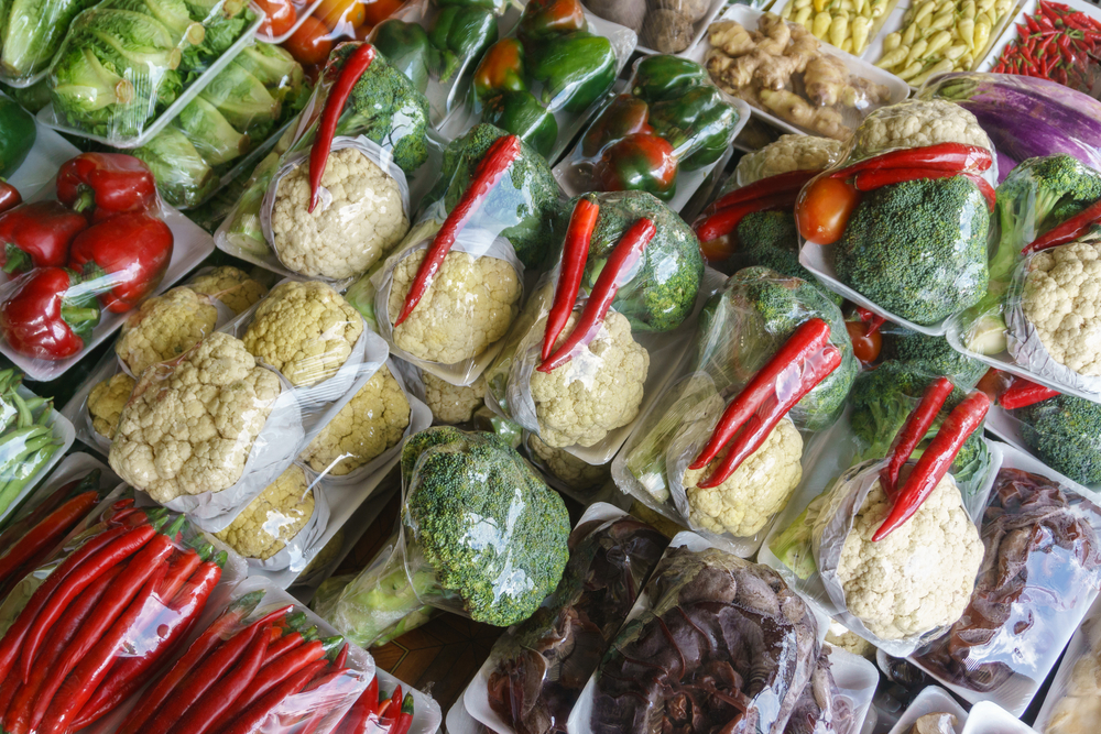 Vegetables wrapped in plastic.