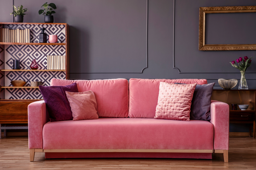 Pink velvet sofa.