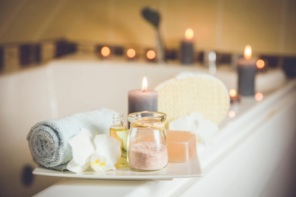 Bathtub with salts and candles.
