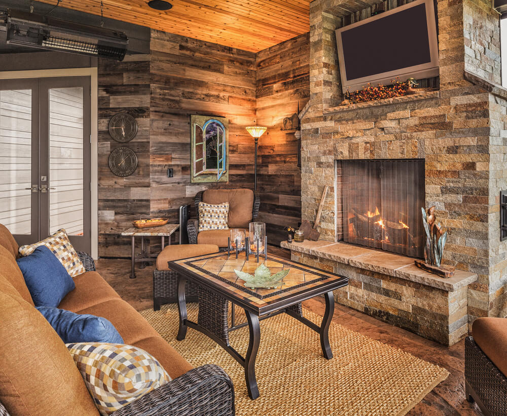 A rustic living room with masonry walls.