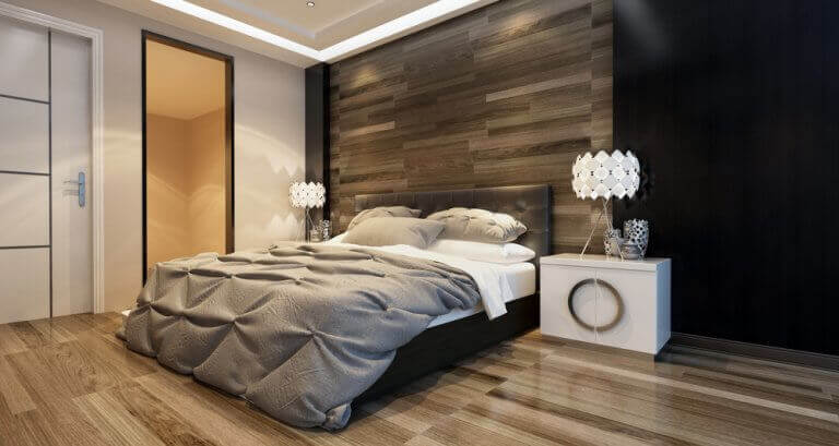 Slaapkamer met wand van hout