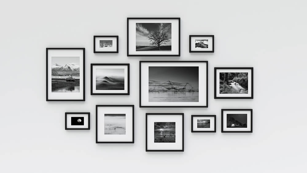 Mural com suas fotos em preto e branco-fotos de família