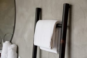 Simple wooden towel racks make great bathroom accessories.