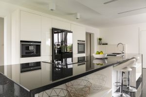 A simple and stylish black kitchen counter will add a touch of sophistication.
