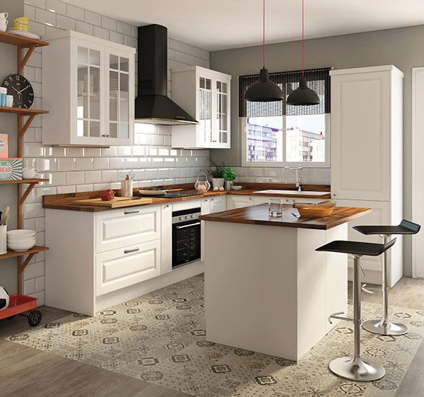 A kitchen with reclaimed wood countertops.