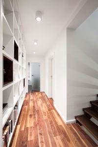 Choosing light colors for your narrow hallways will make them seem wider.