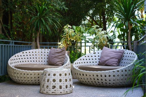 Woven Synthetic Fiber Tables for a Casual Deck Setting