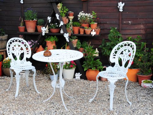 A Victorian style garden should include wrought iron tables and chairs