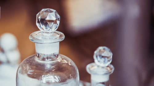 Use items such as crystal bottles that reflect light for a spacious living room