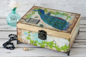 Boxes are often decorated using decoupage.