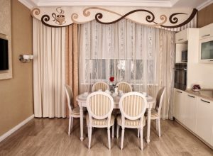 Lace or embroidered kitchen curtains will add a touch of sophistication and charm.