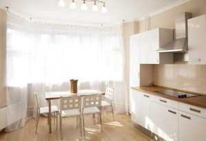 Choose translucent kitchen curtains to make sure your room gets plenty of light.