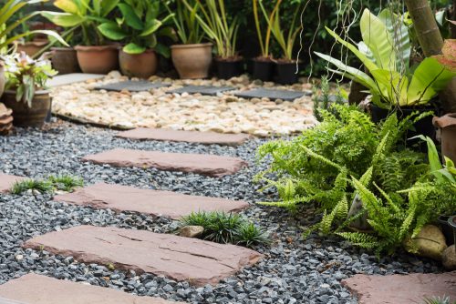 Use large stones and crushed gravel in your garden paths
