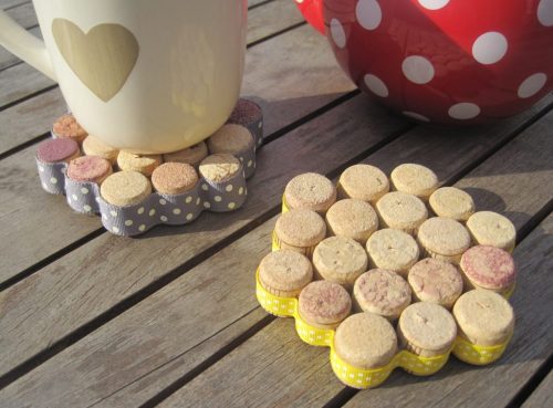 You could create cup coasters or placemats to decorate with corks
