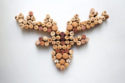 To decorate with corks you could create some figures of animals or other things
