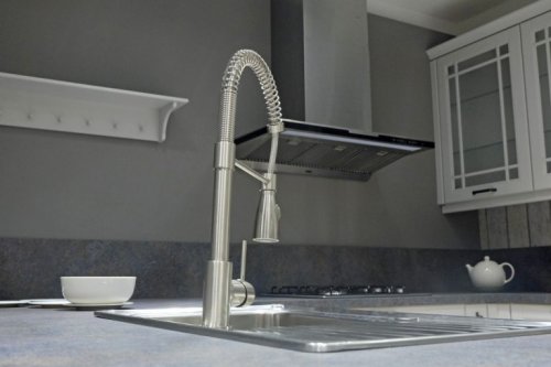 Faucet with extendible end