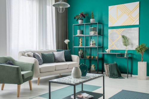 You should include some bright color such as turquoise and some natural items such as plants to balance out a decor including gold and silver