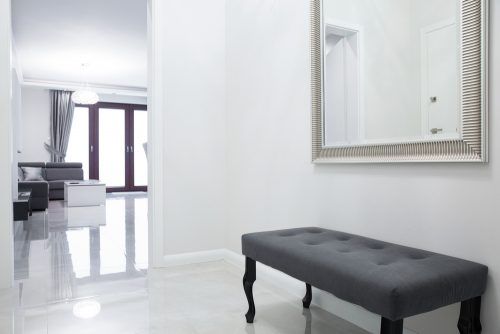 Here is another of the seats for decorating entry halls, a simple yet elegant bench seat with a cushioned fabric top