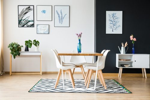 Keep to the same color theme without when choosing a rug in the dining room
