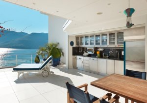 Having an open air kitchen will allow you to enjoy a warm summer's evening with friends.