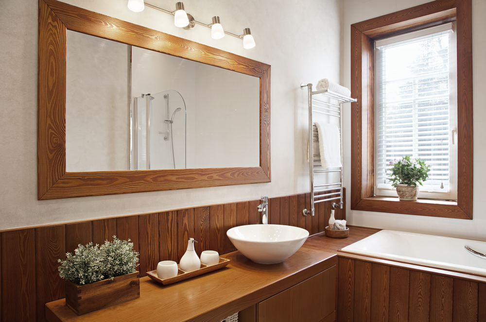 Adding wood is a great way to create natural bathrooms.