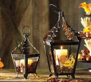 Use a mixture of autumnal fruits to decorate your lanterns.