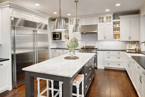 Kitchen decorated with white marble couters