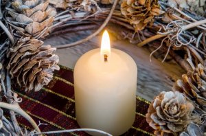 Make some beautiful Christmas centerpieces using candles, twigs and pine cones.