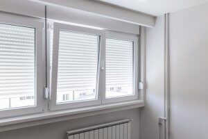 windows with metal blinds