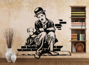 A decal sticker shows Charlie Chaplin as the tramp, sitting beside a dog on a brick stoop.