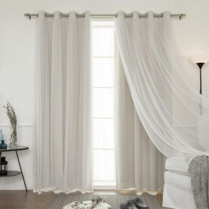 Thin curtains in a white, light living room.