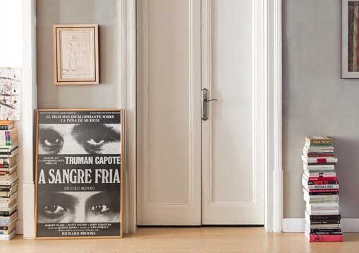 A pile of stacked books on the floor