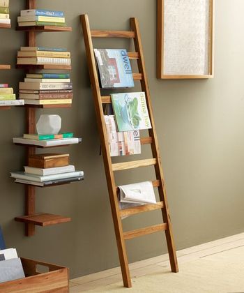 Cute timber vertical bookshelf with a timber ladder with books