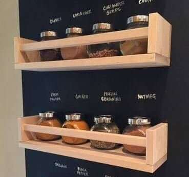 A chalkboard spice rack on the wall.