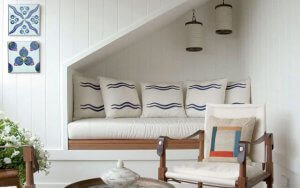 A couch under the stairs.