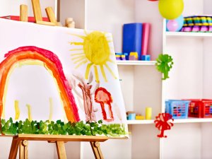 A canvas with a painting in a playroom.