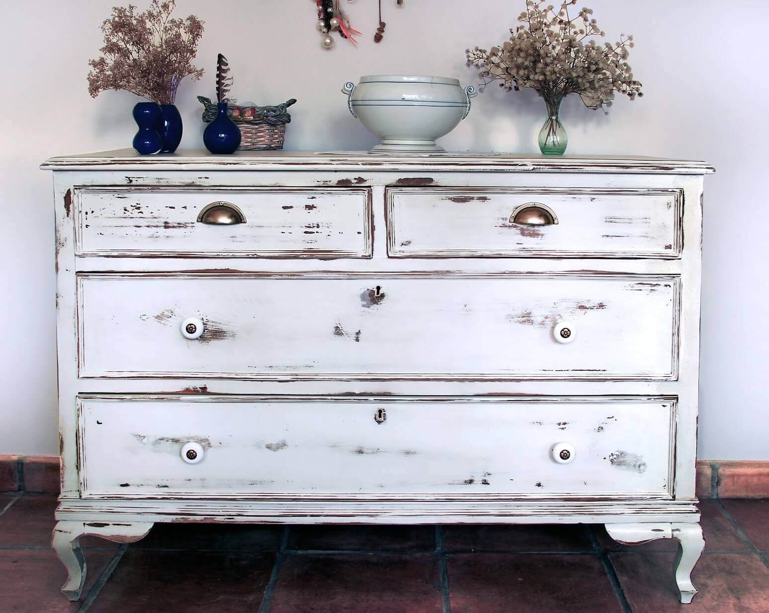 Age Your Wooden Furniture With A Distressed Paint Effect