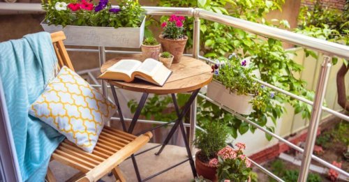 A reading corner outside on a balcony.