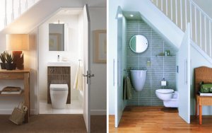 A small bathroom under stairs.