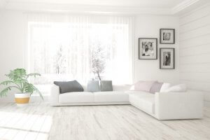 Whitish wood floor in a living room.