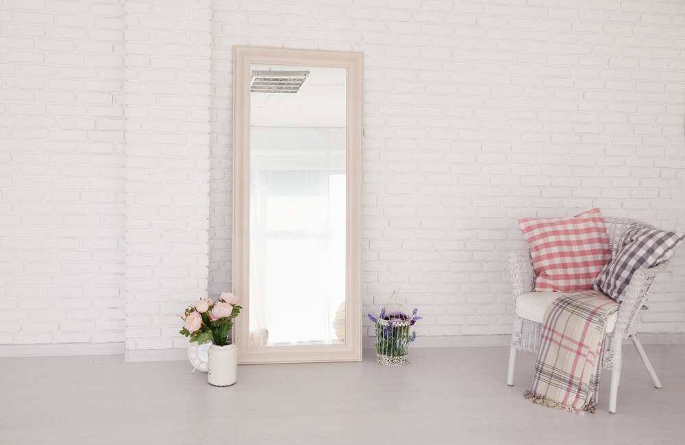 A large mirror making a space feel brighter.