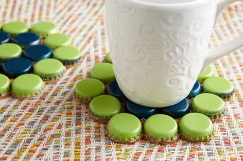 A couple drink coasters made with bottle caps.