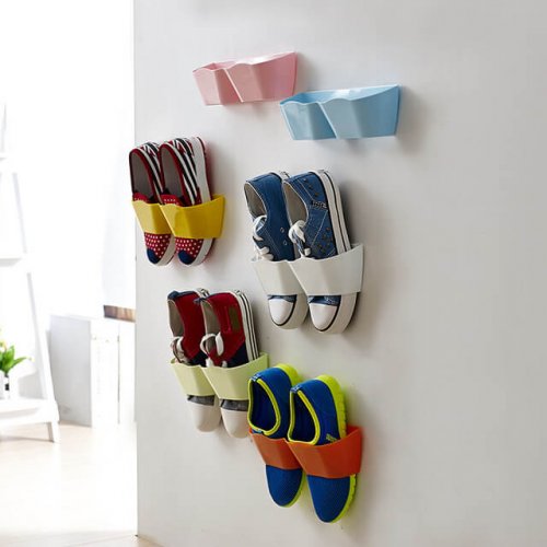 A few pairs of hanging shoes.