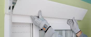 A person removing a board.