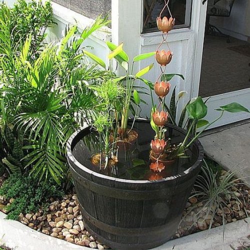A rain chain that goes into a pot.